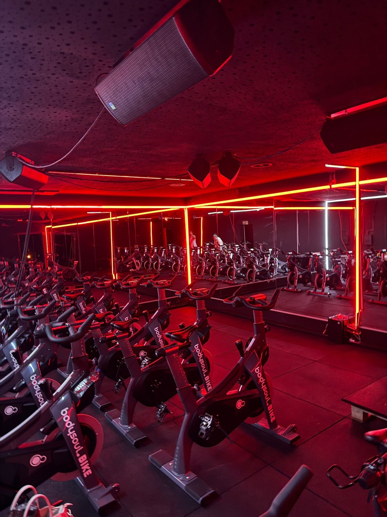 bodysoul cycling room with red lights